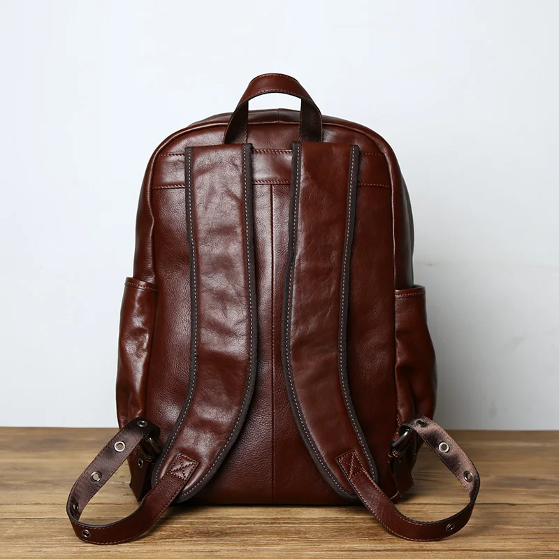kf-Ha94dd5d548274c87aa989f053ce512407-NZPJ-Leather-Men-s-Backpack-European-and-American-Fashion-Travel-Bag-Vintage-Head-First-Layer-Cowhide