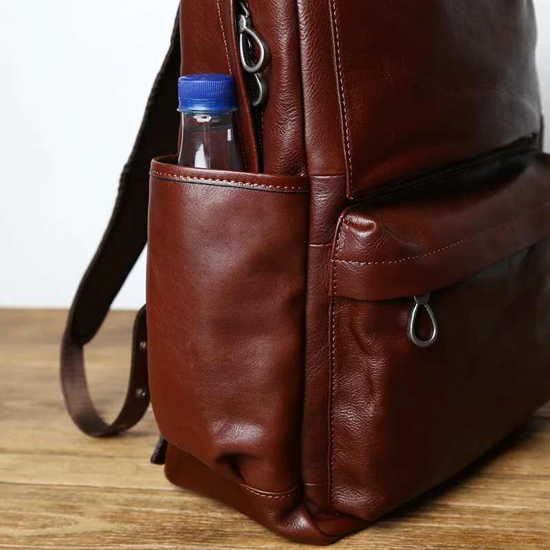 kf-Hd7c0cc1a1d37489d8926ba0a1f6cd3437-NZPJ-Leather-Men-s-Backpack-European-and-American-Fashion-Travel-Bag-Vintage-Head-First-Layer-Cowhide