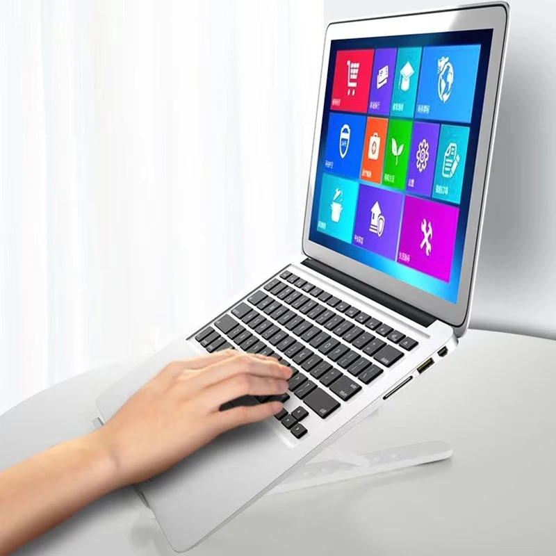 kf-S900e79f8988542b1ab72b9324eed19c6F-1pcs-Portable-Laptop-Stand-Tablet-Holder-For-Computer-Foldable-Support-Base-Cooling-Pad-Lifting-Plate-Notebook