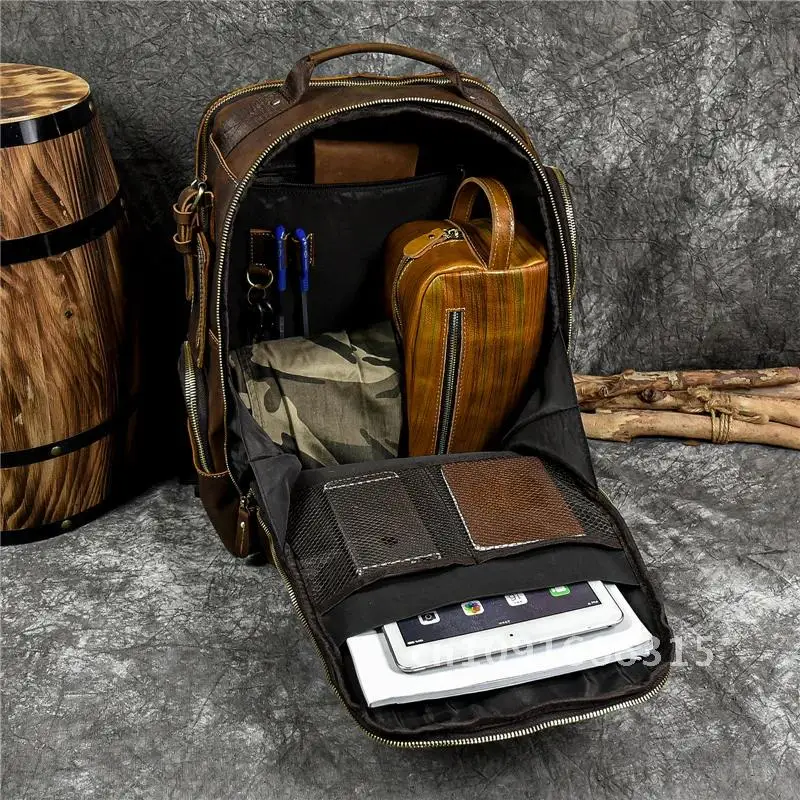 kf-S87b55a43035043208cc7a7602806c2c1i-Newsbirds-men-s-leather-backpack-retro-luxury-fashion-style-bagpack-travel-bag-backpack-school-bag-for